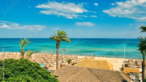 Bild auf Leinwand Hammamet, Tunisia - MAY 16, 2025: Beach of Hammamet, the first tourist destination in Tunisia