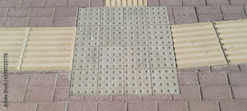 Schilderij op canvas tactile paving for visually impaired on sidewalk