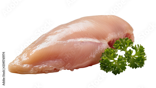 Raw boneless skinless chicken breast with parsley garnish