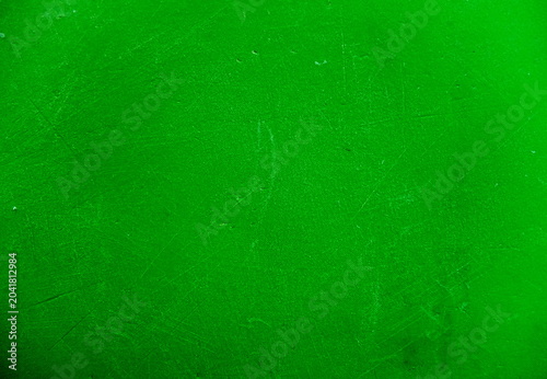 Bright green scratched grunge background texture