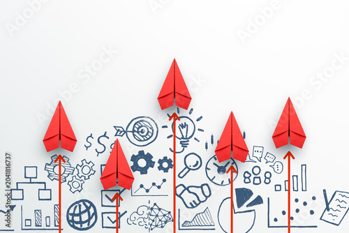 Business success, innovation and solution concept. Red paper planes and business strategy on white background