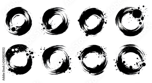 Tablou pe pânză Set of Eight Black Ink Brush Stroke Circles with Splatter Effects