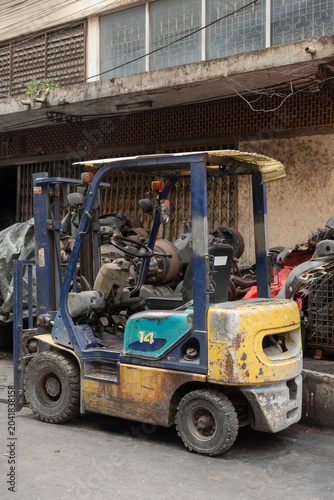 Forklift truck in workshop station background.