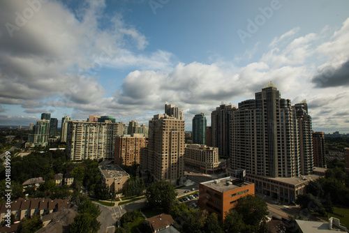 Photography Toronto Skyline with High-Rise Buildings and Clouds, Canada