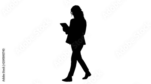 Photos Silhouette woman walking while using tablet isolated on transparent background,