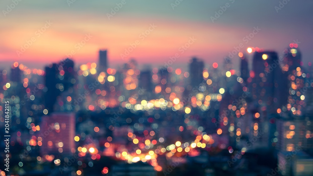 Naklejka premium Blurred City Skyline at Dusk