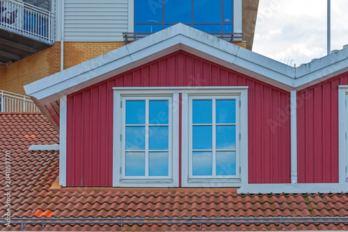 Cuadro en lienzo Red Wood Cabin House Dormer Windows at Roof in Sweden