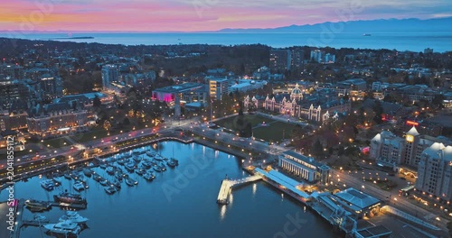 Aerial view of BC Legislative Parliament Building near harbor at night in Victoria, British Columbia, Canada	
