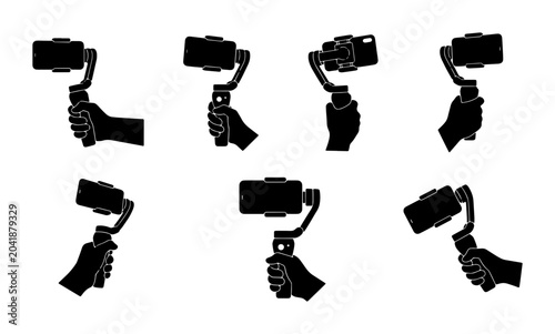 Φωτογραφία Hand holding smartphone gimbal stabilizer for smooth video filming, multiple ang