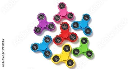 Colorful fidget spinners arranged in a circle on white background with colorful