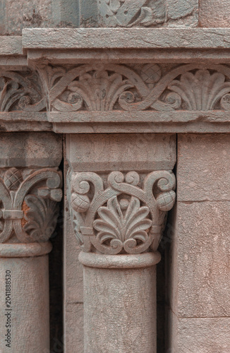 Obraz na płótnie Elements of architectural decorations of buildings, columns, pommel and arches, plaster moldings, plaster patterns
