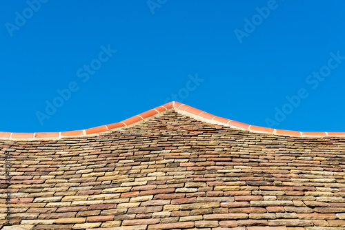 Photography particular red roof of an old house