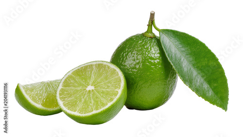 Whole lime with leaf and two slices