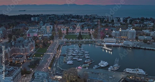 Aerial view of BC Legislative Parliament Building near harbor at night in Victoria, British Columbia, Canada	

