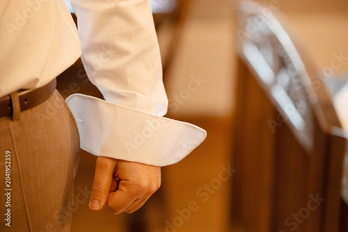 Elegant Groom Getting Ready for Wedding Ceremony in Classic Formal Attire
