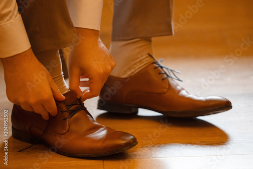 Elegant Groom Getting Ready for Wedding Ceremony in Classic Formal Attire
