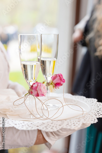 Wedding Guests Welcomed with Champagne and Traditional Bread Ceremony