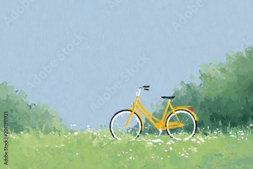 A yellow bicycle parked in a field of lush green grass and white flowers with trees in the background and a bright blue sky above.