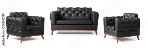 Obraz na plátne Luxury black leather living room furniture set featuring a two-seater chesterfield sofa and two matching armchairs, isolated on a white background