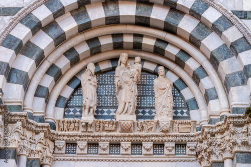 Pistoia - The detail of medieval side portal of Baptistery of San Zeno cathed...