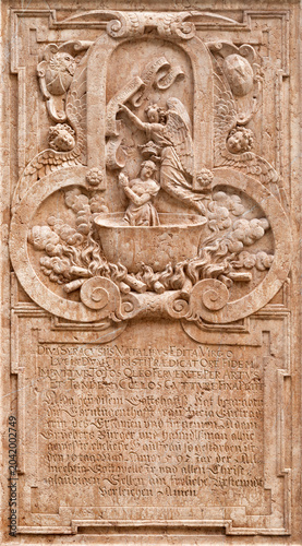 SALZBURG, AUSTIRA - SEPTEMBER 8 2025: The stone relief of martyrdom of St. Ap...
