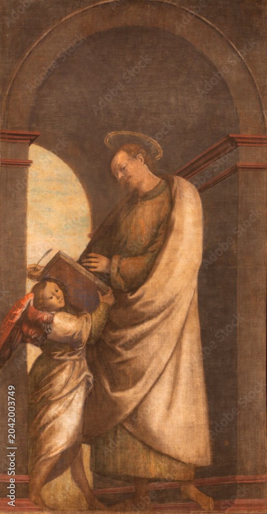 Obraz premium VERCELLI, ITALY - JANUARY 16, 2026 - The painting of St Matthew the evangelist in the church Chiesa di San Cristoforo by unkonwn artist. 