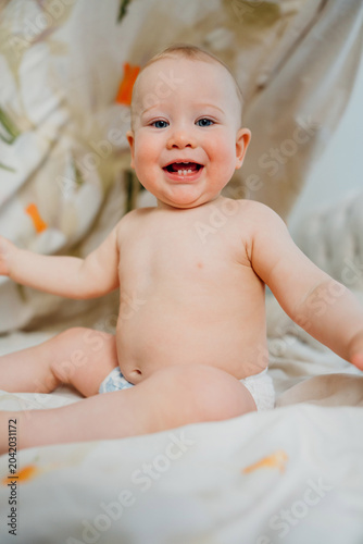 Close-up Portrait of Smiling Baby Boy