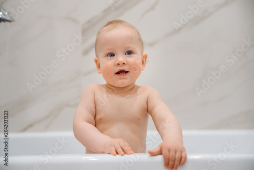 Close-up Portrait of a Baby Taking a Bath