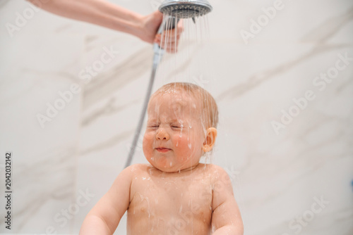 Close-up of Baby Washing Hair in Bathtub