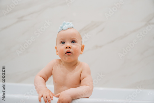 Funny Baby with Soap Foam Mohawk Taking a Bath