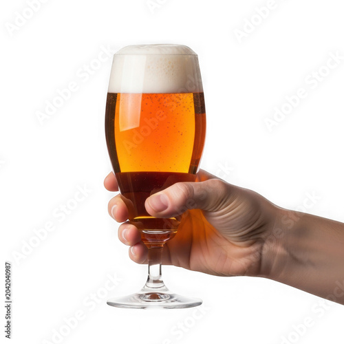 Hand holding beer glass with golden beer and foamy head, cheers, clear background.