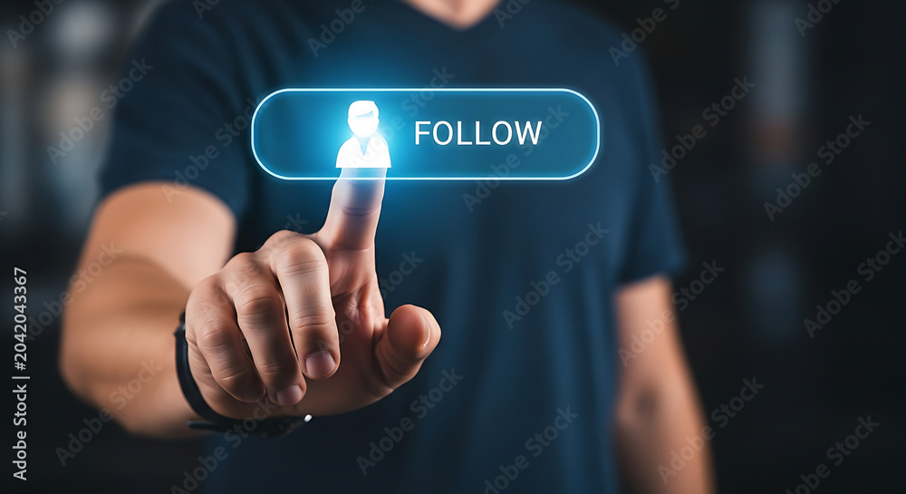 Obraz premium Hand pressing glowing follow button on digital interface with futuristic technology background