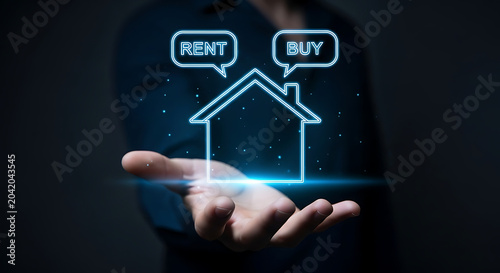 Hand Holding Digital House Icon with Send and Buy Concepts Over Dark Background