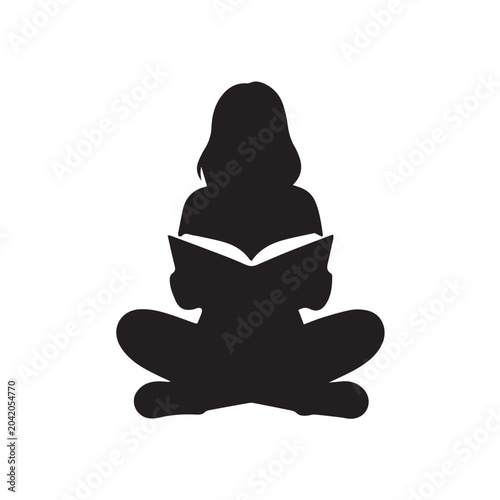silhouette of a girl reading a book