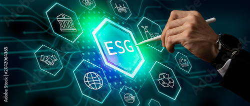 Fotografi ิperson is pointing to the word ESG on it