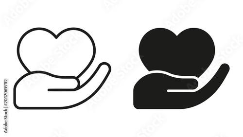 Fotografie Heart icon held in open palm hand for care charity or medical support concepts i