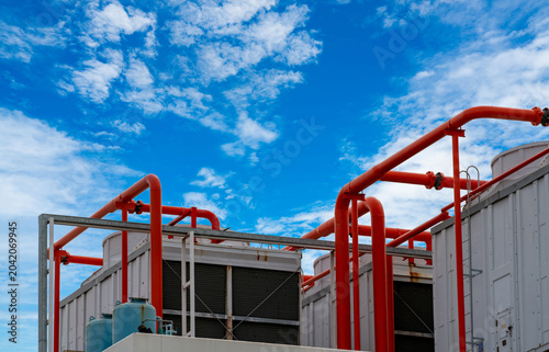 Foto Cooling tower on roof top of building