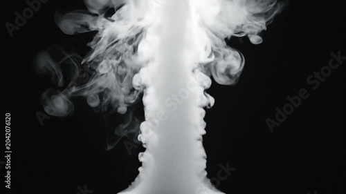Abstract White Smoke Rising Upward Against a Black Background Displaying Atmospheric and Ethereal Imagery
