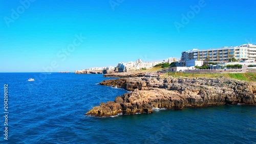 Polignano a Mare - Italy, Apulia - rising aerial view of the bathing bay