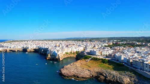 Polignano a Mare - Italy, Apulia - side-rotating aerial view at high altitude
