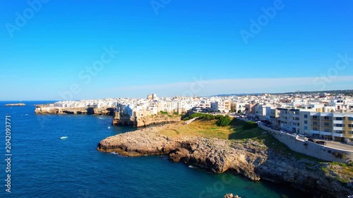 Polignano a Mare - Italy, Apulia - sideways circling aerial photograph