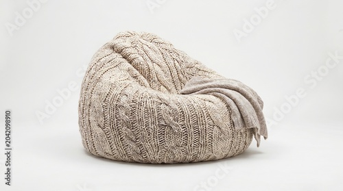Cozy beige knitted bean bag chair on white background for home decor and furniture design inspiration