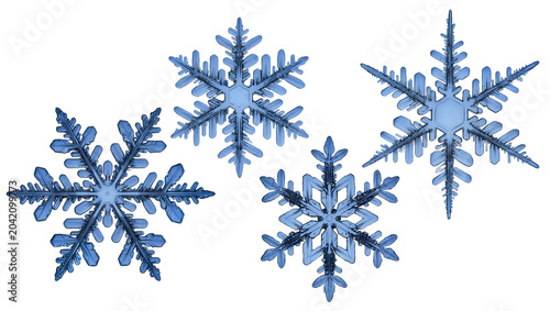 Canvas Print Four intricate blue snowflakes with detailed crystalline structures