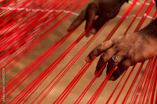 Weaving Kanchipuram silk sari.