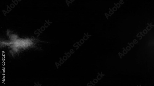 Bright flash of light with white smoke effect creating abstract and dynamic visuals with a dark background