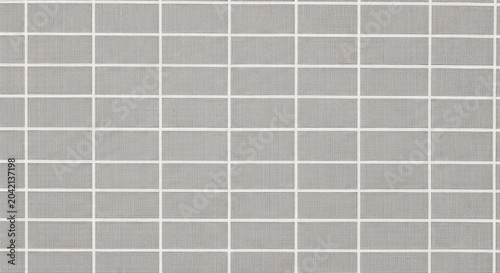 Seamless Gray Grid Pattern Background with White Lines.