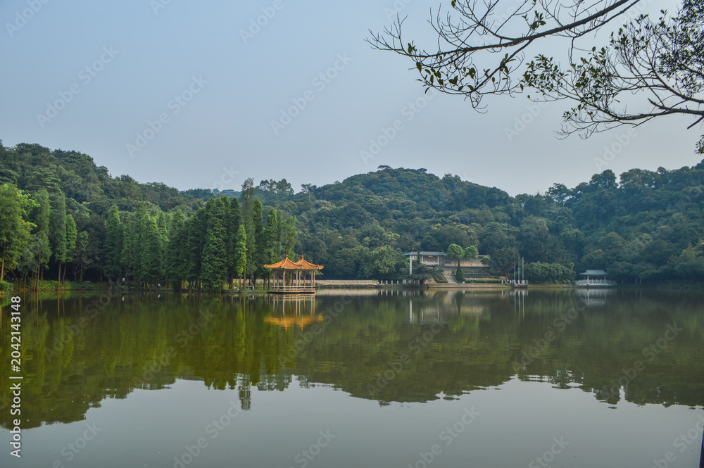 Naklejka premium Xiqiao Mountain Lake Scenic Area, Foshan China with Traditional Pavilion