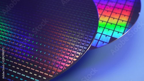 Silicon wafer for manufacturing semiconductor of integrated circuit.Electronic circuit designs have been built onto the wafers using micromaching including photolithography