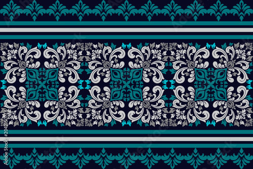 The luxurious velvet carpet slide features a swirling pattern inspired by indigenous tribes.