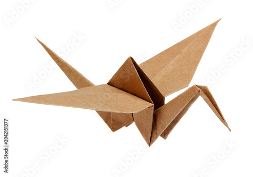 Brown kraft paper origami crane, handmade paper bird isolated on transparent background PNG